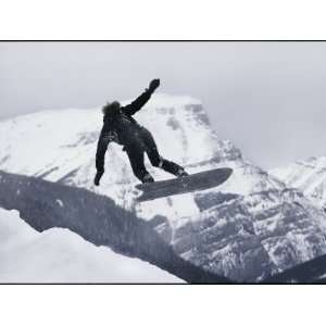 Snowboarder Catches Air, Banff National Park, Alberta, Canada Premium 