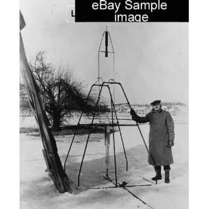 1925 Scientist Dr. Robert H. Goddard with a rocket 