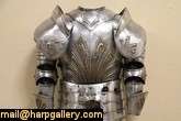   set of wearable armor and a helmet are about 60 years old and fit a