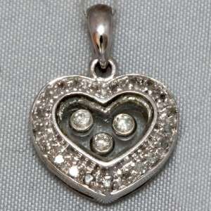 14k white gold floating diamonds heart shape dangling pendant  