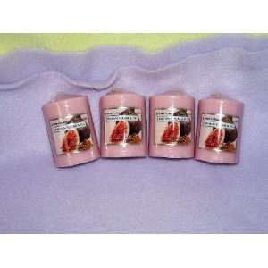   Four Brown & Fig scented Candles sold as a set.