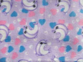 Cute fleece fabric by the yard: purple dolphins hearts  