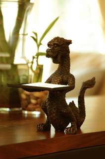   iron dragon business card holder makes a whimsical addition to a desk