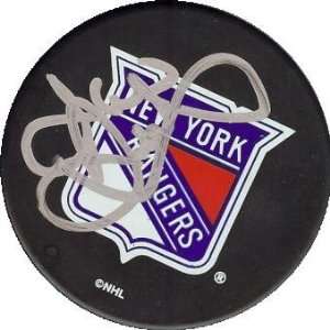 John Davidson autographed Hockey Puck (New York Rangers)